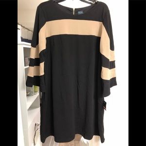 Super sophisticated black dress with tan stripe.